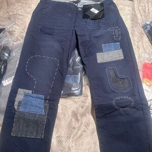 Mostly Heard Rarely Seen Navy Blue Graphic Jacket Insert khaki style pants. Sz38